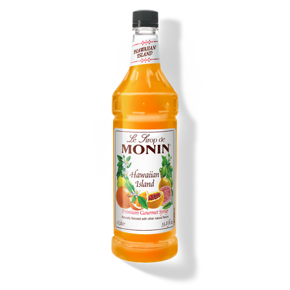 A bottle of Le Trop de Monin Hawaiian Island Refreshing Syrup, filled with golden-orange liquid, on a white background with a soft shadow.