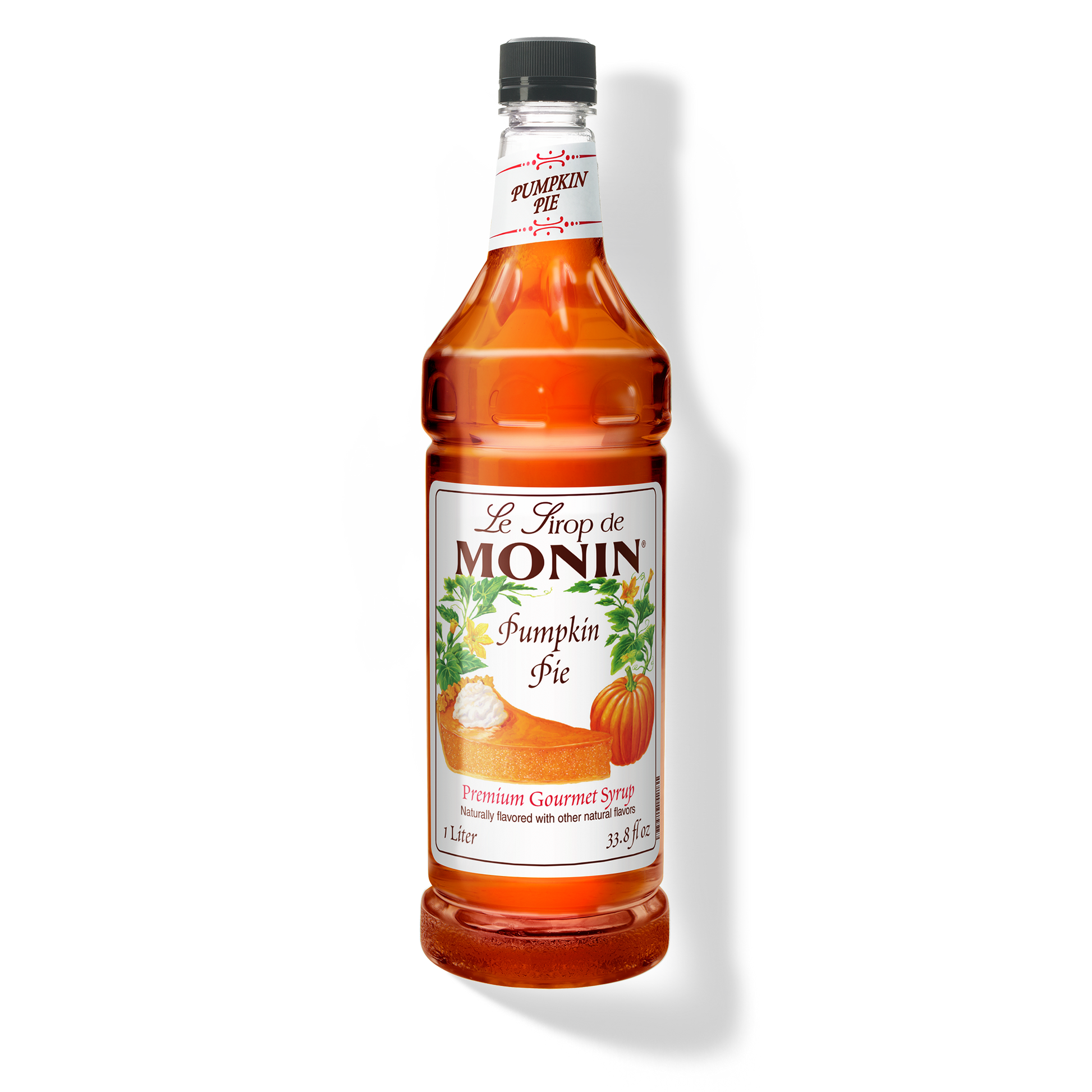 Monin Pumpkin Pie syrup bottle on a white background