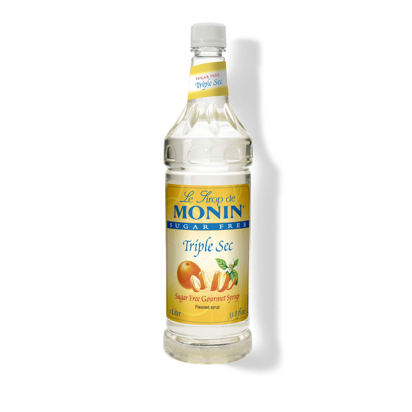 A bottle of Monin Triple Sec sugar-free flavored syrup on a white background with a soft shadow.