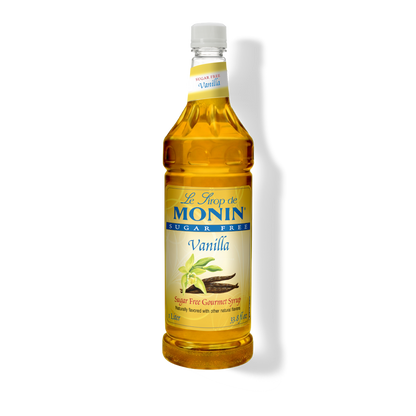 A bottle of Le Sirop de Monin Vanilla Sugar Free syrup on a white background with a soft shadow.