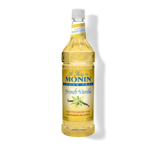 A bottle of Monin French Vanilla sugar-free syrup on a white background with a soft shadow.