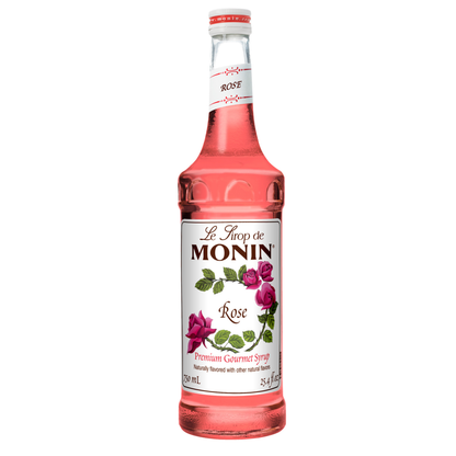 Rose Monin syrup bottle on white background 