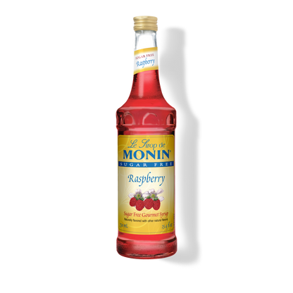 A bottle of Le Flôc de Monin Sugar Free Raspberry Syrup on a white background with a soft shadow.