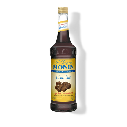 A bottle of Le Gout de Monin Sugar Free Chocolate Syrup on a white background with a soft shadow.