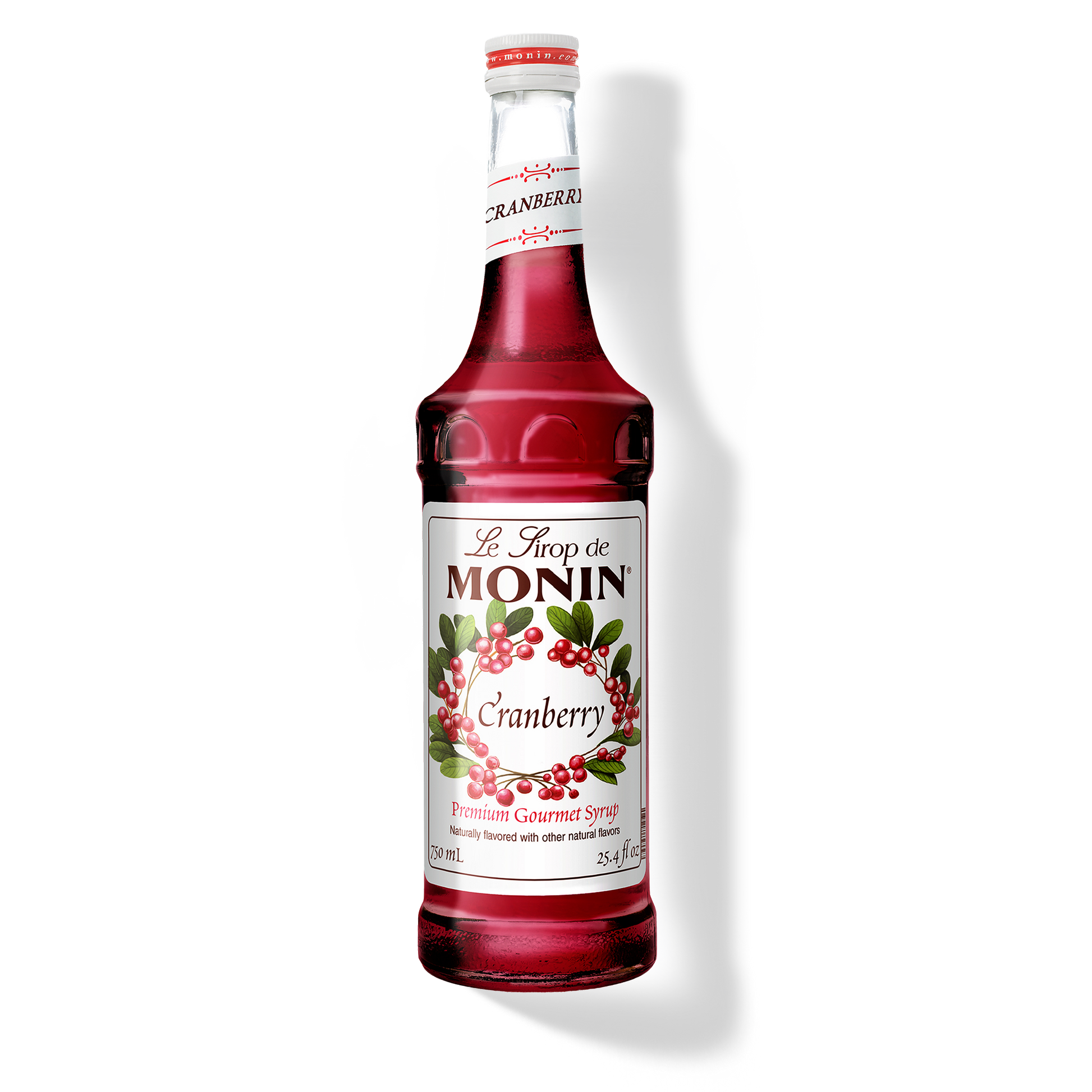 Monin Cranberry syrup bottle on a white background
