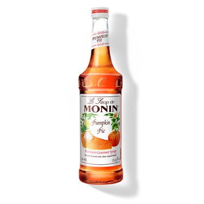 Bottle of Monin Pumpkin Pie syrup on a white background