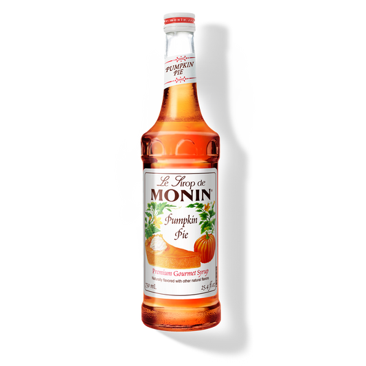 Bottle of Monin Pumpkin Pie syrup on a white background