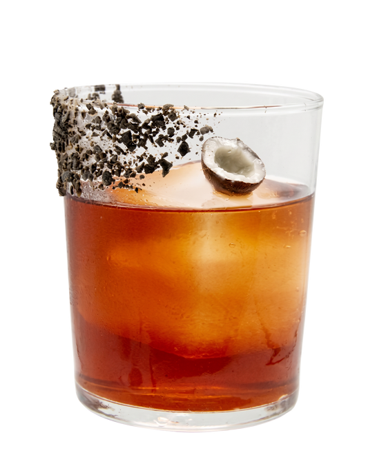 Coconut Boulevardier, orange drink in glass cup