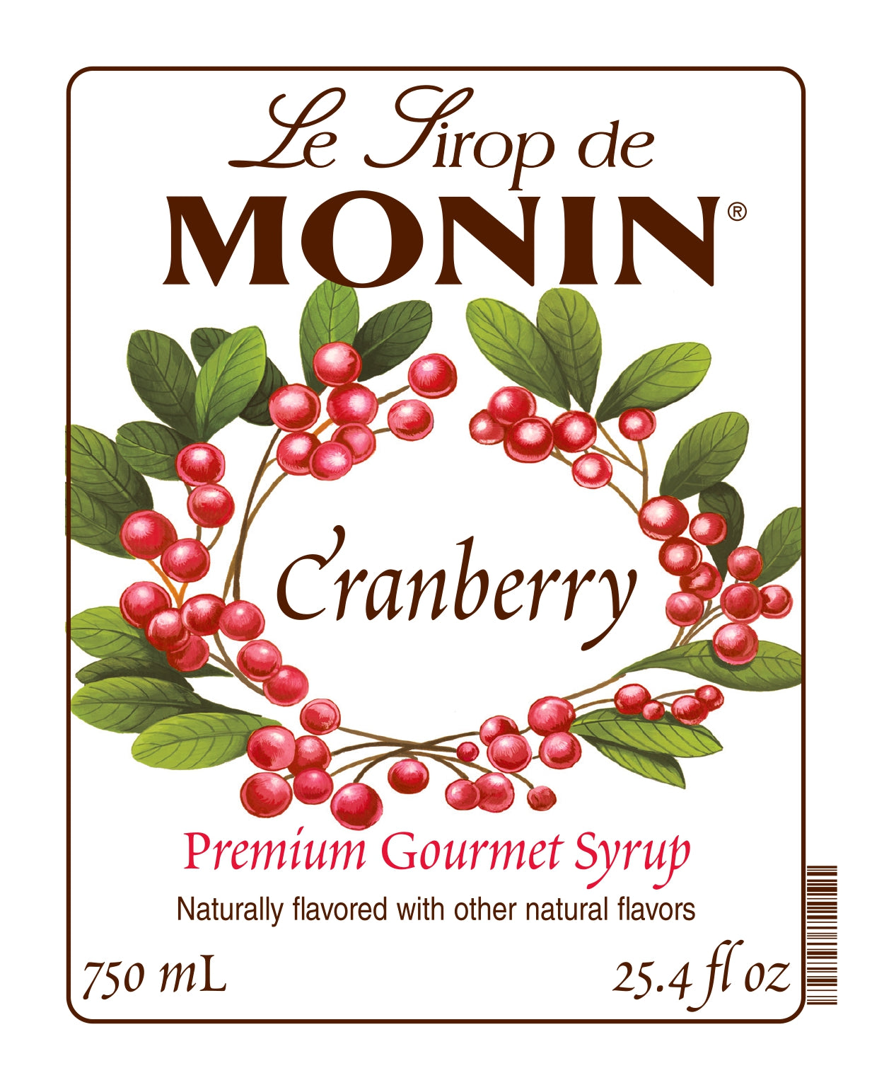 750ML Monin Cranberry syrup label with berries and leaves on a white background