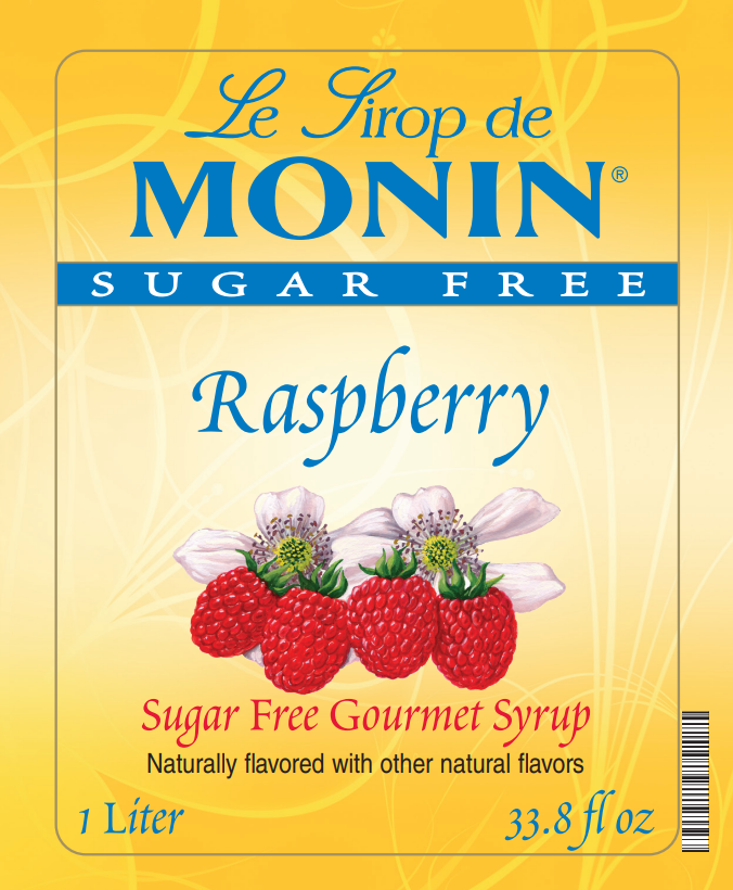 Front of a Le Sirop de MONIN Sugar Free Raspberry syrup box, with a yellow label showing raspberry berries, white flowers, and text including 'Raspberry', 'Sugar Free Gourmet Syrup', and '1 Liter / 33.8 fl oz'.