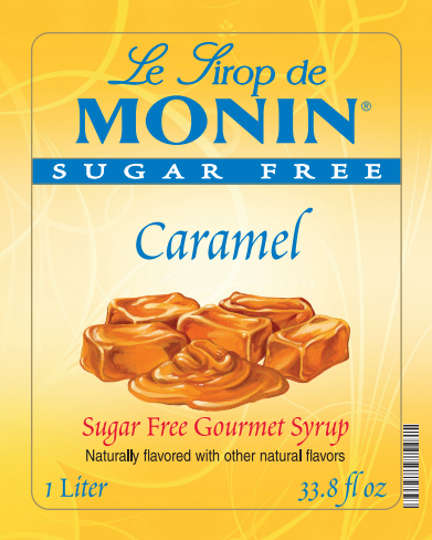 Front of a Le Sirop de Monin Sugar Free Caramel syrup package, showing the brand name, 'Sugar Free' banner, 'Caramel' text, an illustration of caramel cubes and drizzle, and volume text for 1 liter / 33.8 fl oz on a yellow background.