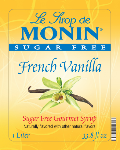 Front of a Le Sirop de Monin French Vanilla sugar-free gourmet syrup carton, showing a yellow label with blue and red text and a vanilla flower illustration.