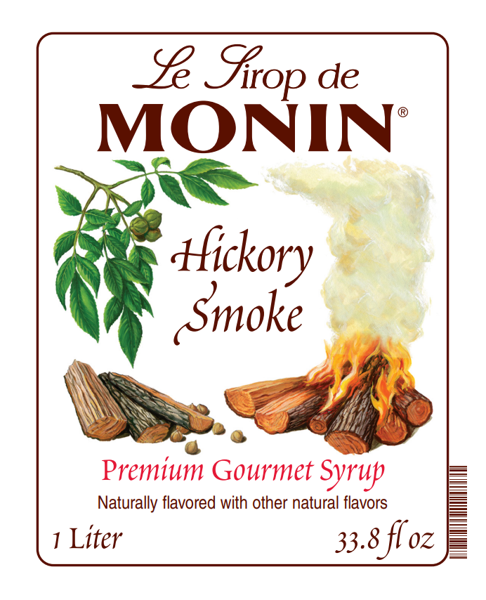 Front label of Le Sirop de Monin Hickory Smoke Premium Gourmet Syrup, 1 Liter (33.8 fl oz), featuring a white background with brown border, brand name, hickory leaf illustration, smoke graphic, hickory logs, and flavor text.